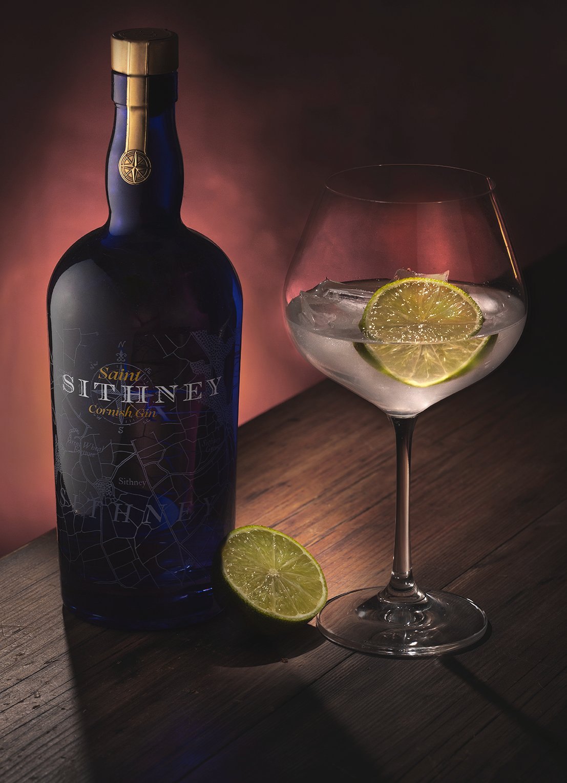 Saint Sithney gin bottle and garnished glass, studio product photography by Lee Searle in Cornwall