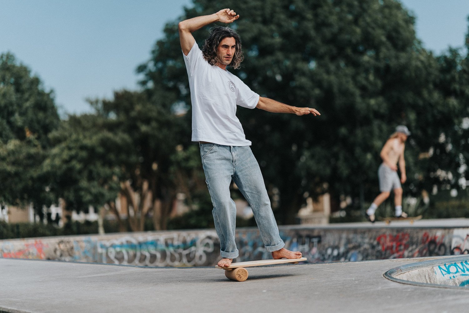 Skateboarder mid-turn in a Cornish skatepark for a clothing brand campaign
